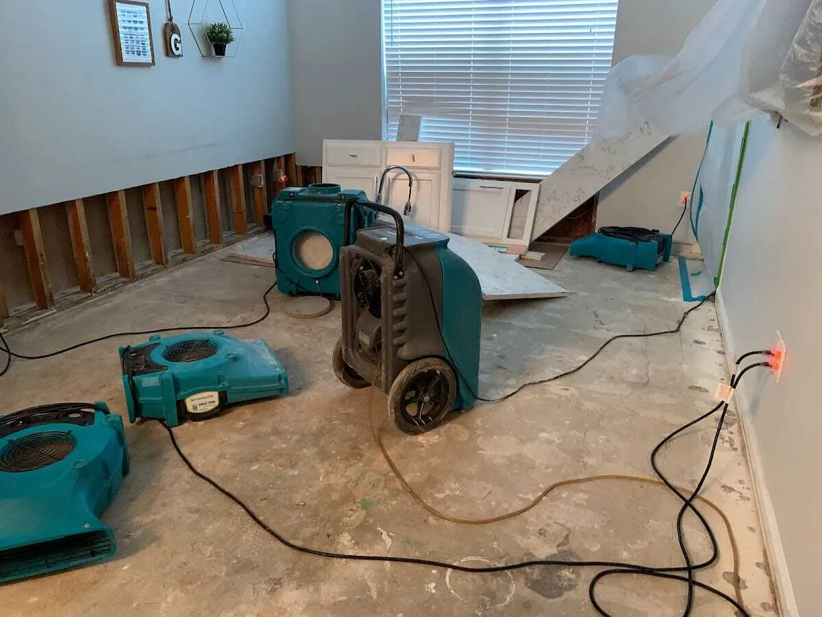 Dehumidifier in flood-cut room for Water Damage Restoration in Rosaryville